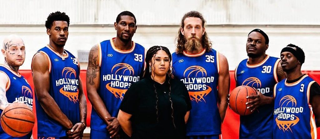 Basketball team wearing custom Wooter uniforms as part of a branded program