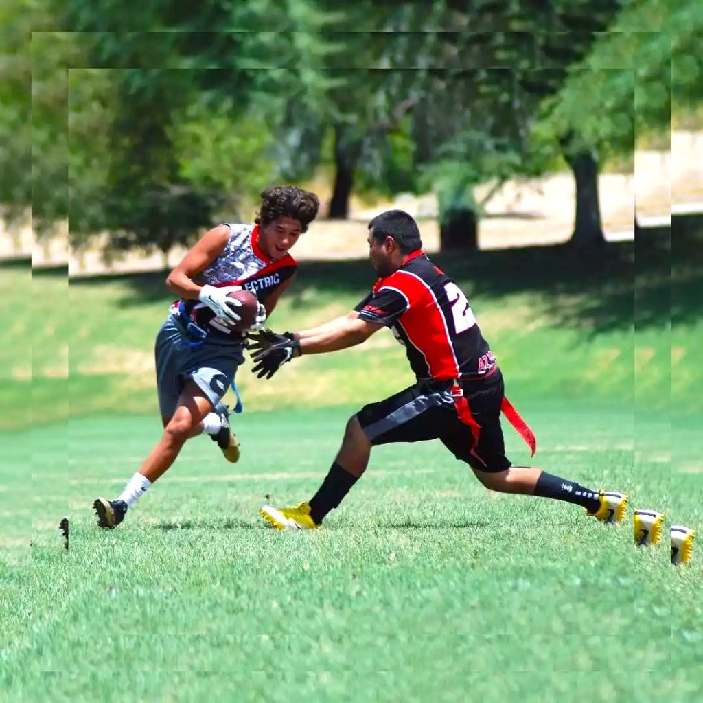7v7 flag football players competing during a tournament game