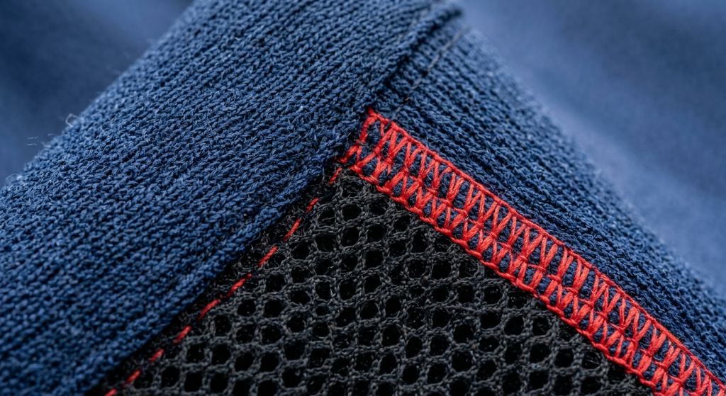 Close-up of a high-quality embroidered logo crest on a hockey jersey.